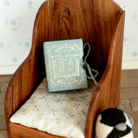 closeup on library books box set on reading chair